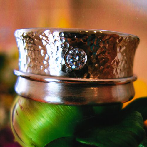 Weissgoldring 585 mit Brillant und beweglichem Innenring